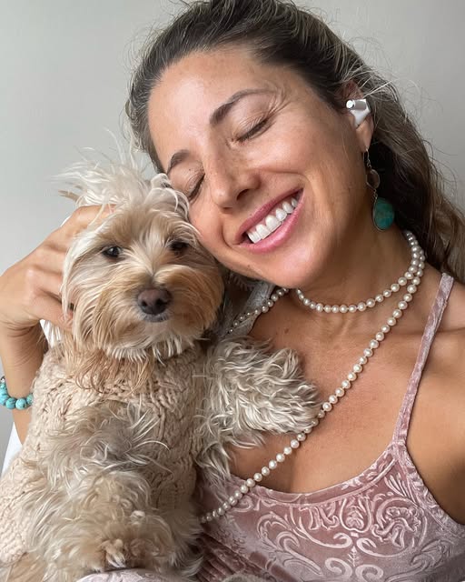 Amore cuddling cheek to cheek with her mommy Dashama